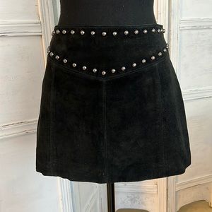 Leather studded mini skirt